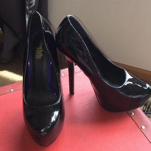 Black hidden patent platform stiletto.